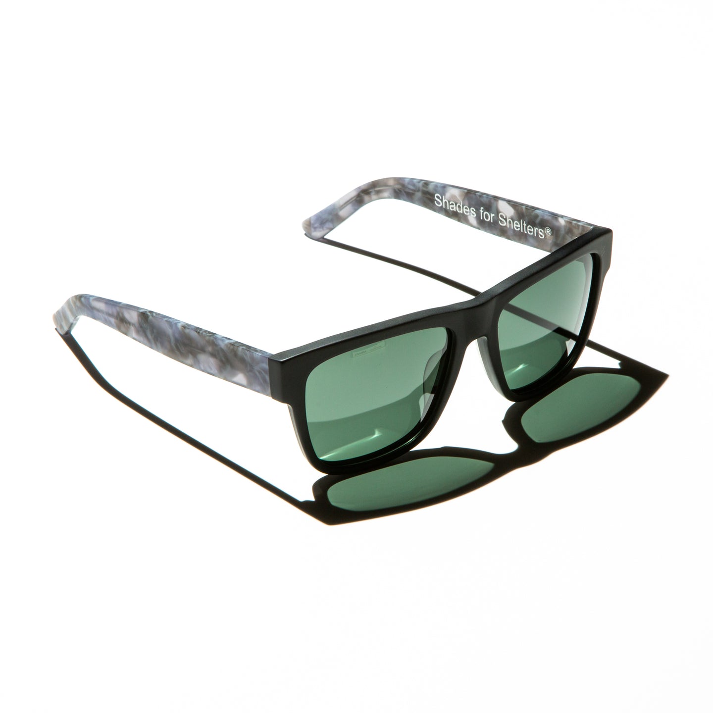 Green lens sunglasses with matte cloudy gray temples