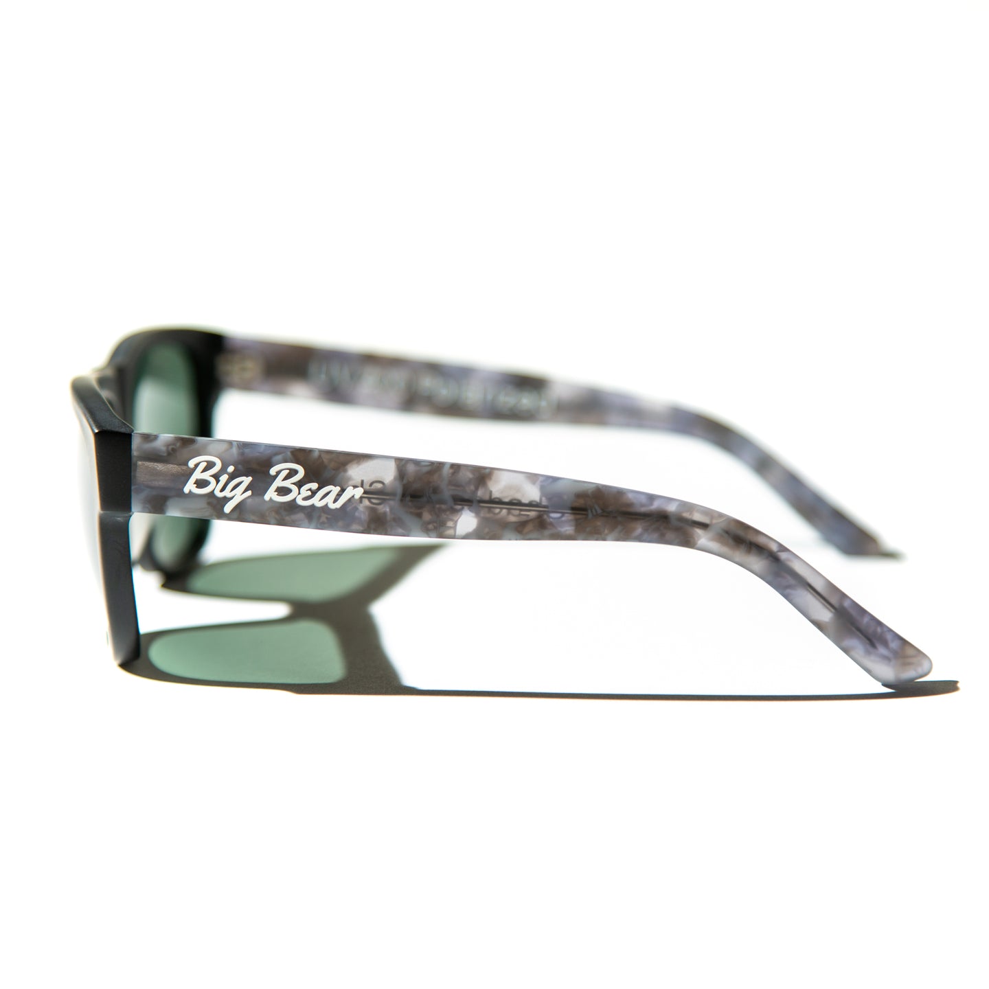 Green lens sunglasses with matte cloudy gray temples