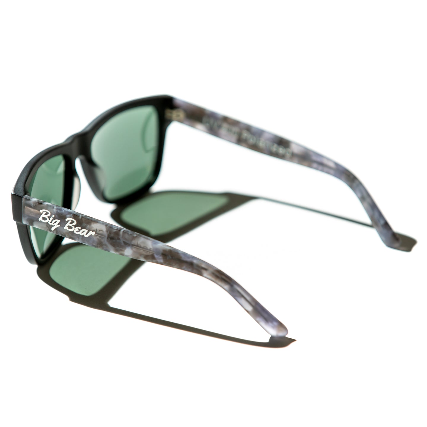 Green lens sunglasses with matte cloudy gray temples