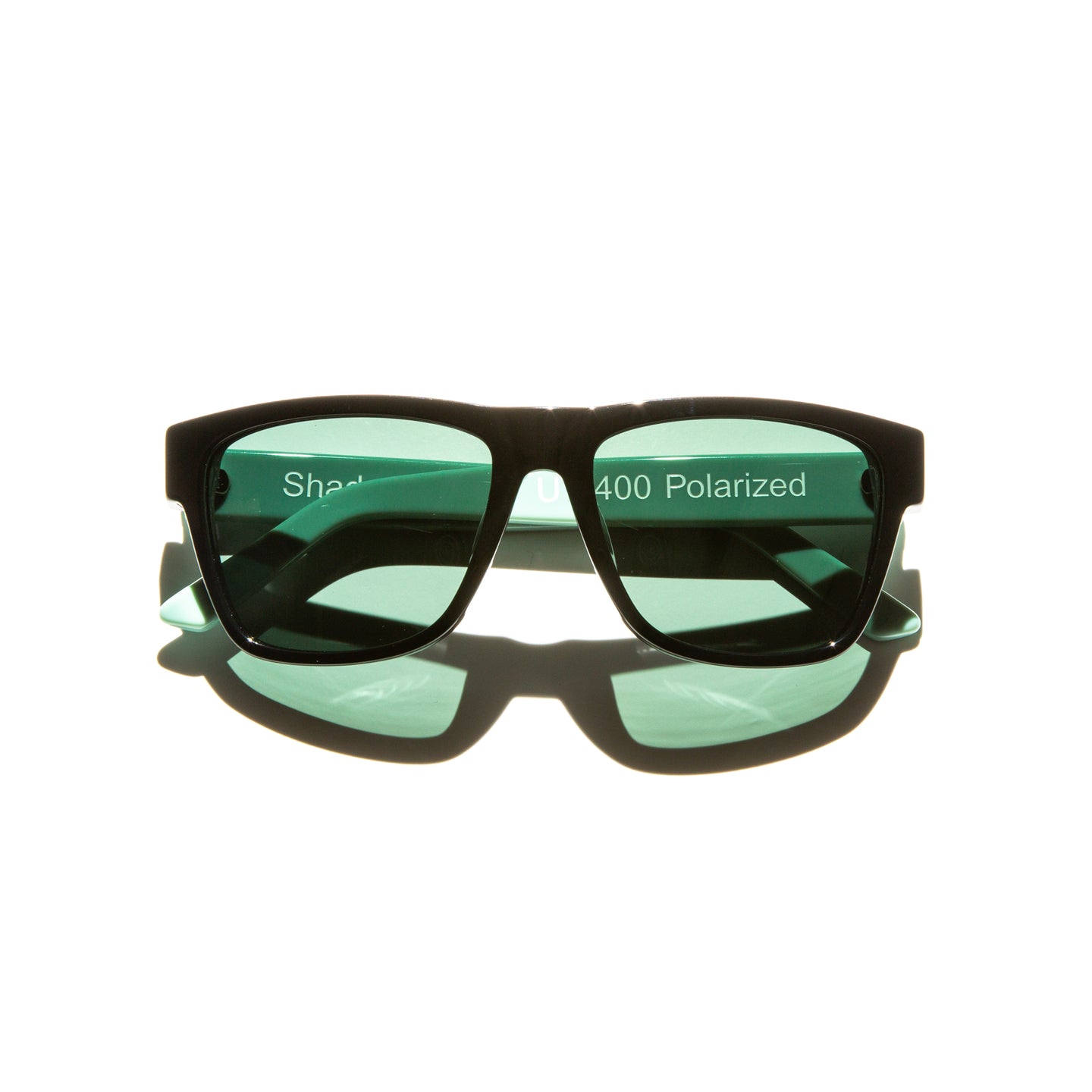 Green lens sunglasses with polished mint green temples