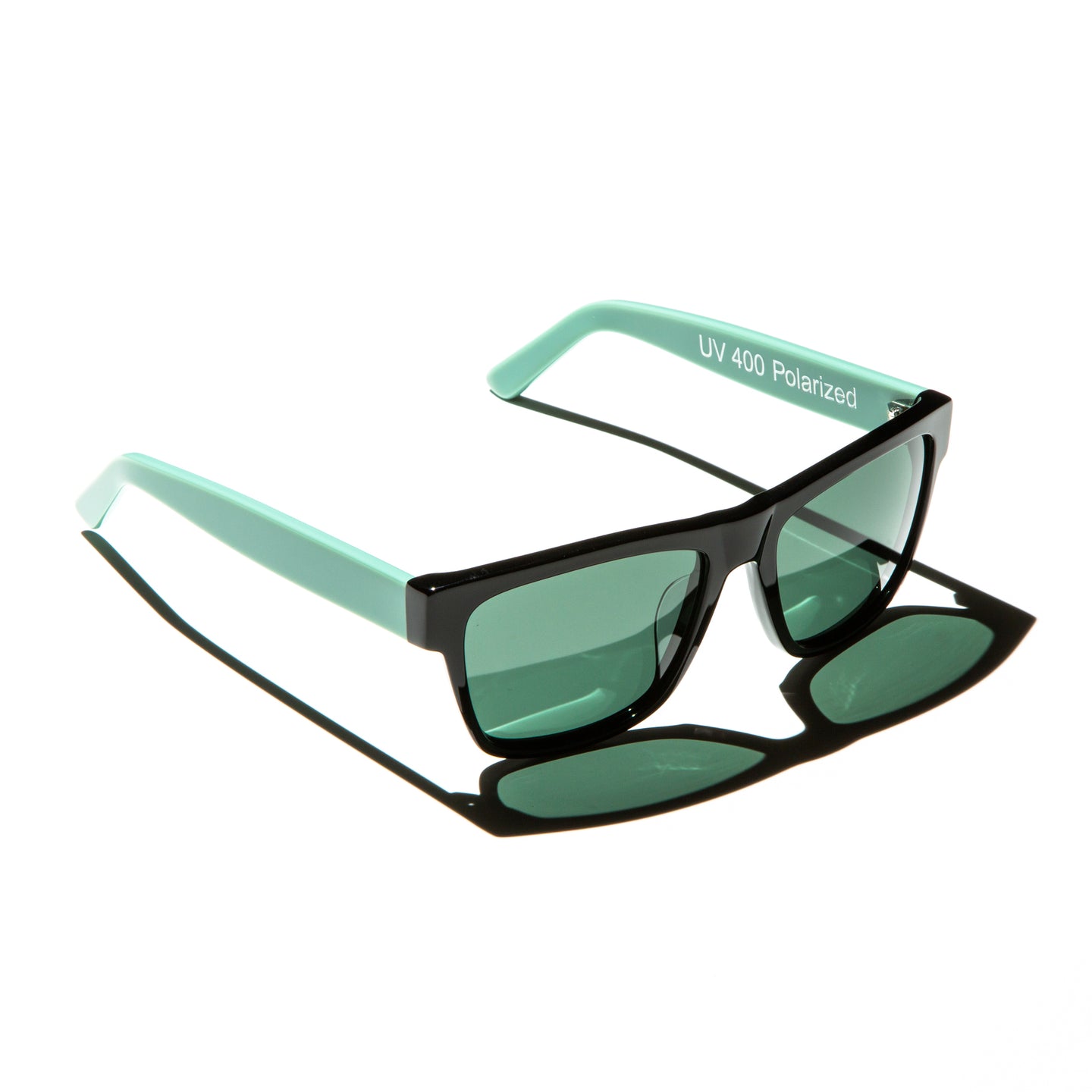 Green lens sunglasses with polished mint green temples