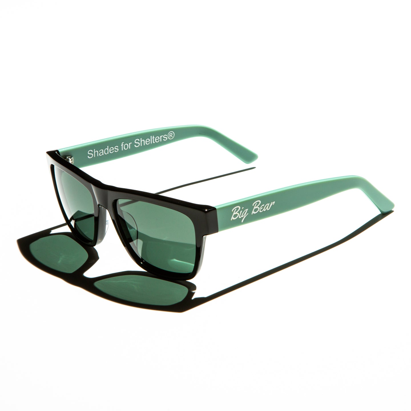 Green lens sunglasses with polished mint green temples