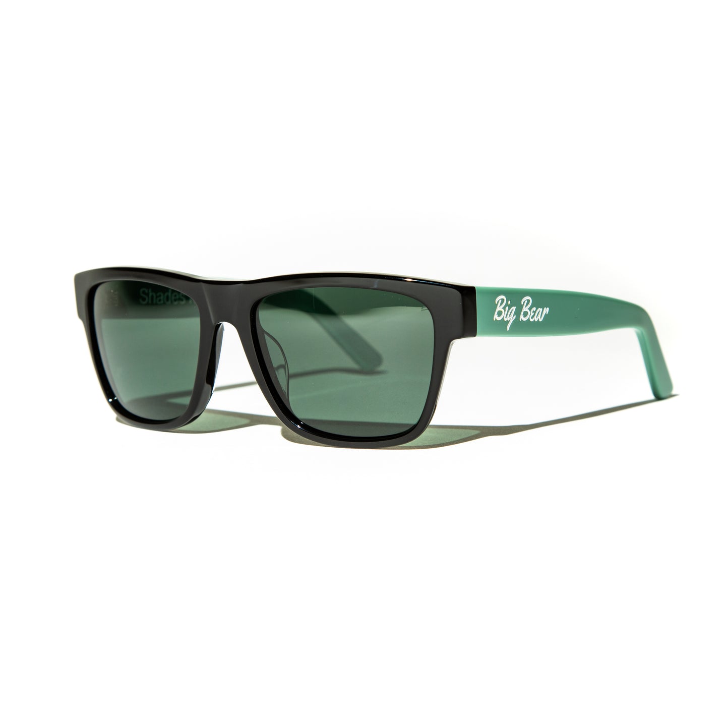 Green lens sunglasses with polished mint green temples